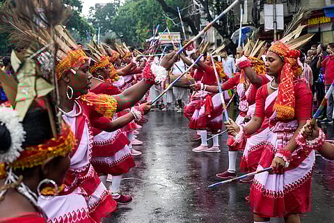 Folk artists perform during Ratha Yatra in Kolkata